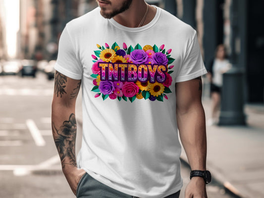 Tntboys logo with colorful flowers and glitter on a white t-shirt.