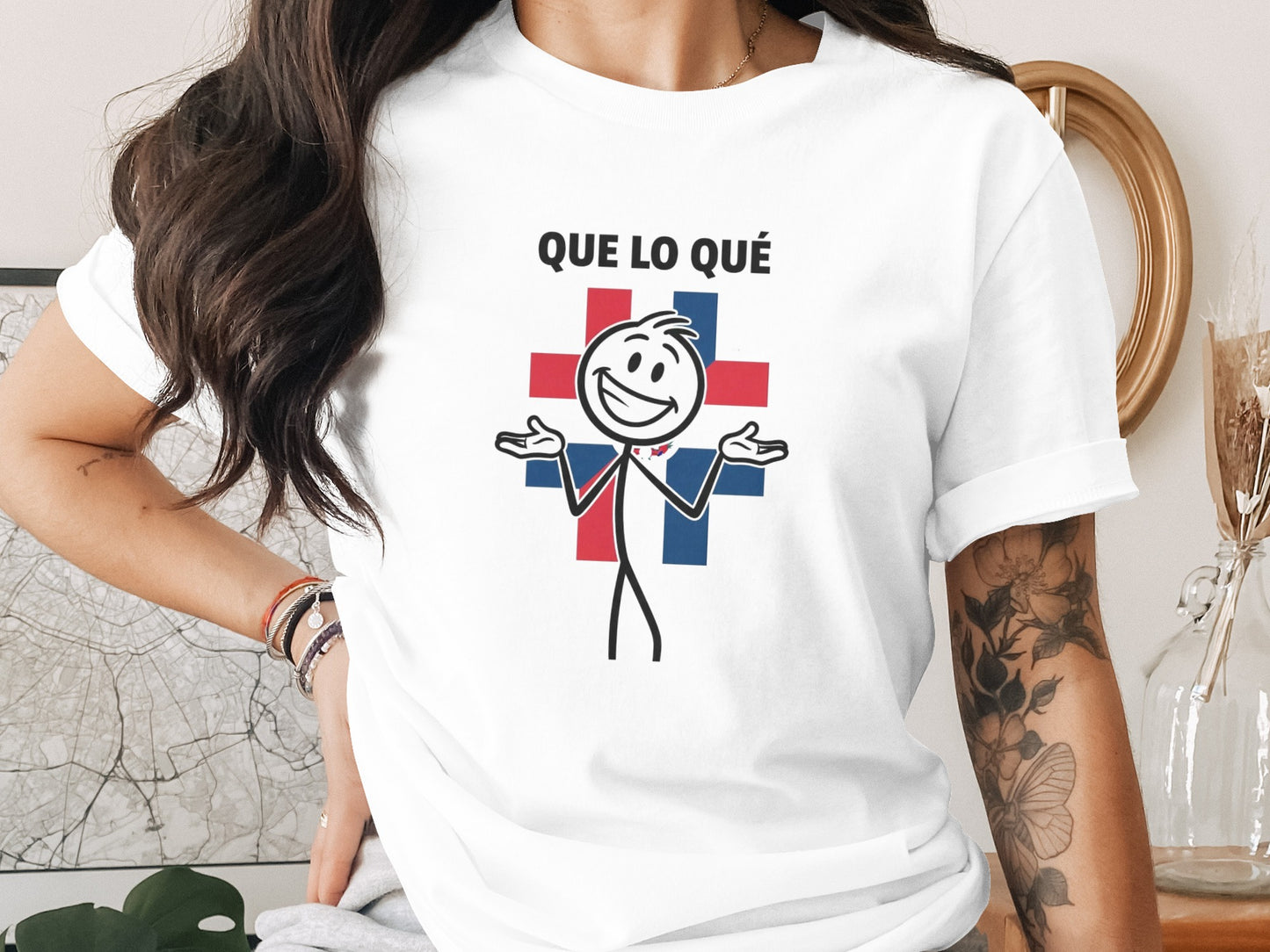 Que Lo Qué Graphic Tee with Cross and Character Design