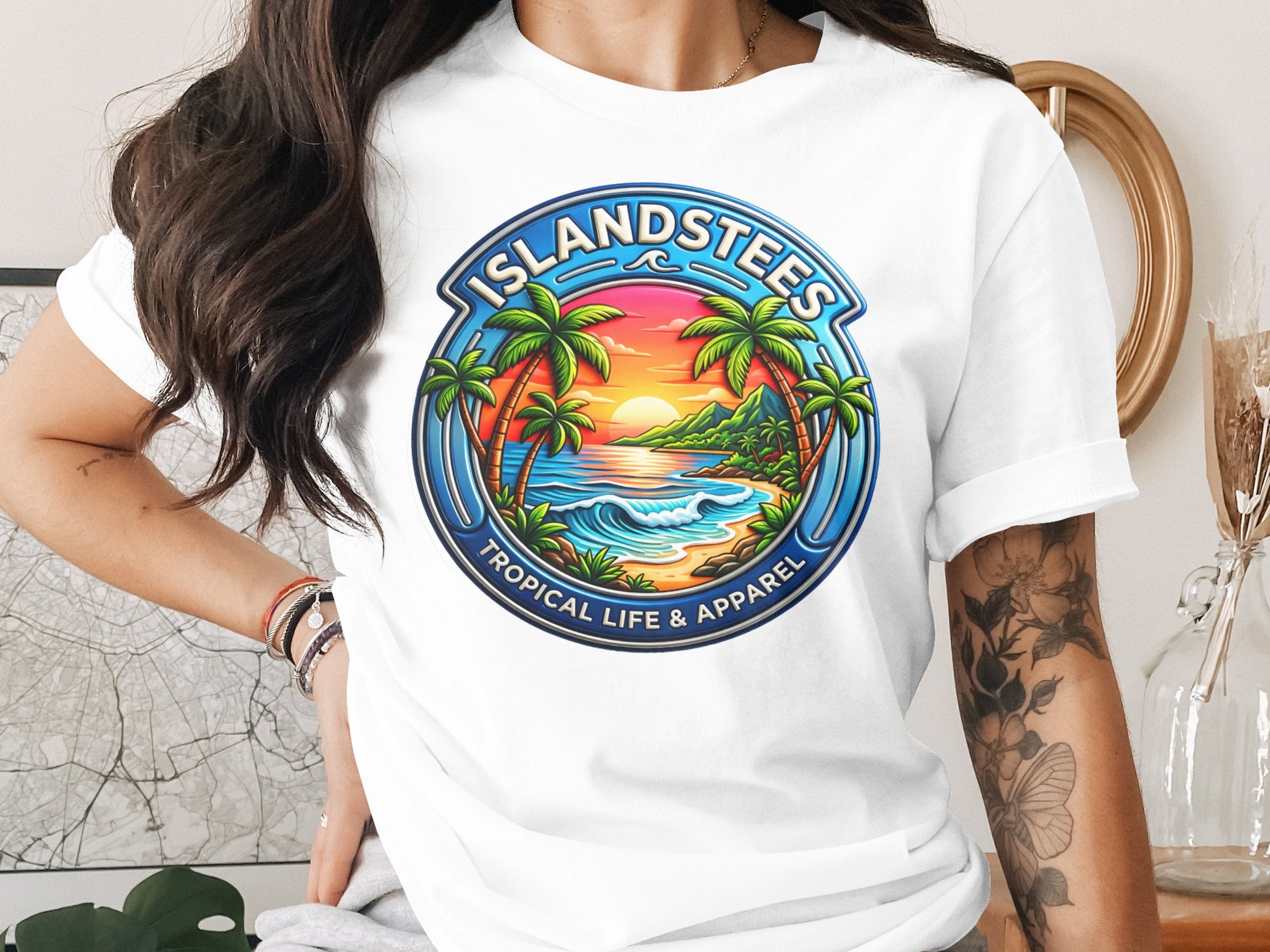Islandstees logo with tropical beach scene and sunset.