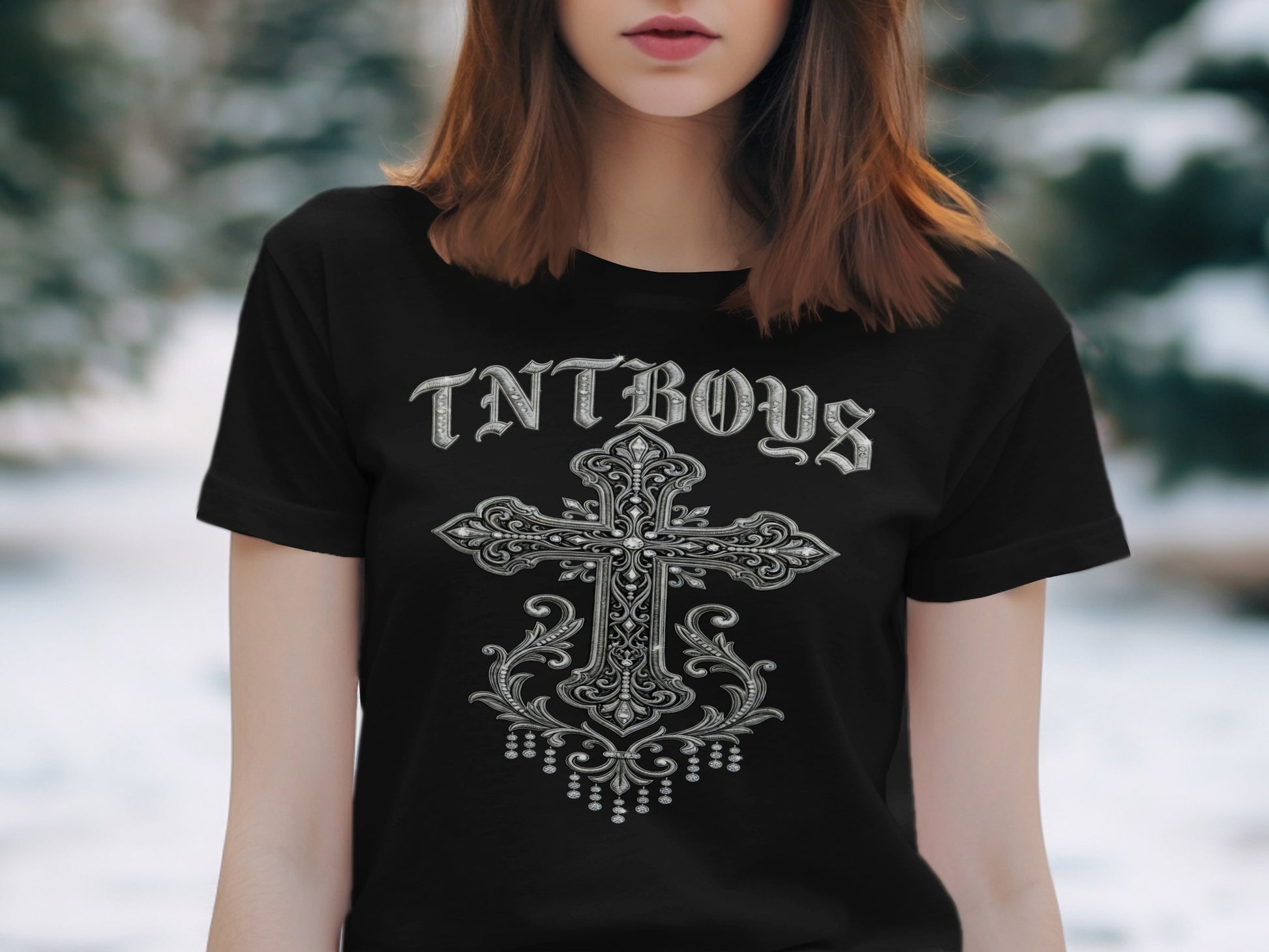 Black t-shirt with ornate silver cross and "TNTBOYS" text.