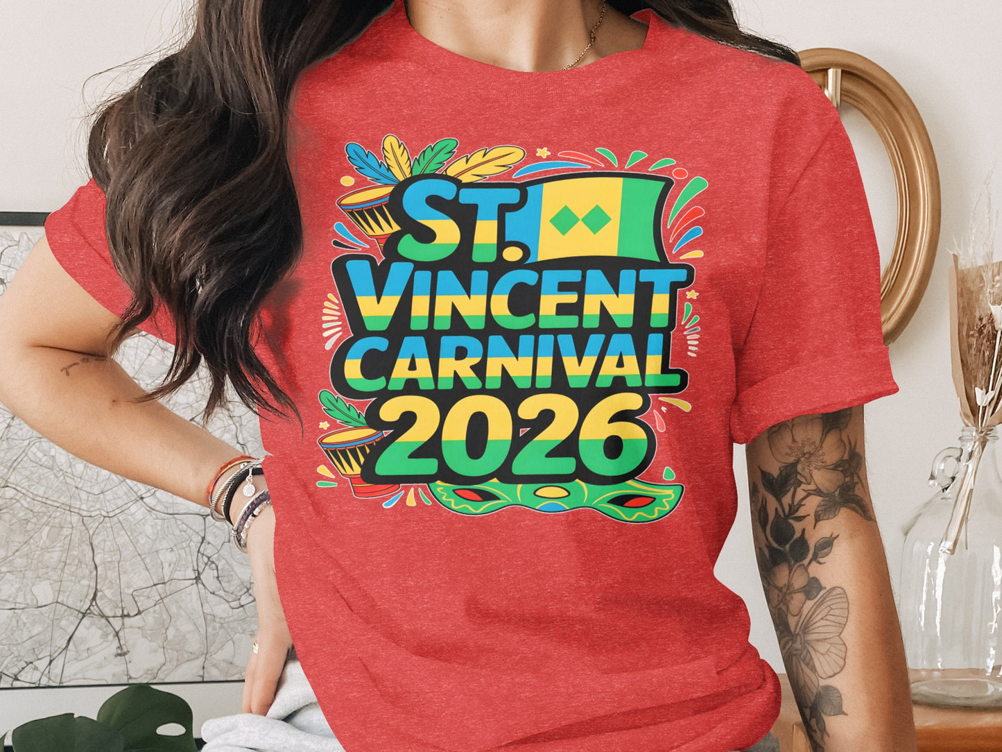 T-shirt with "St. Vincent Carnival 2026" text, flags, drums, and mask.
